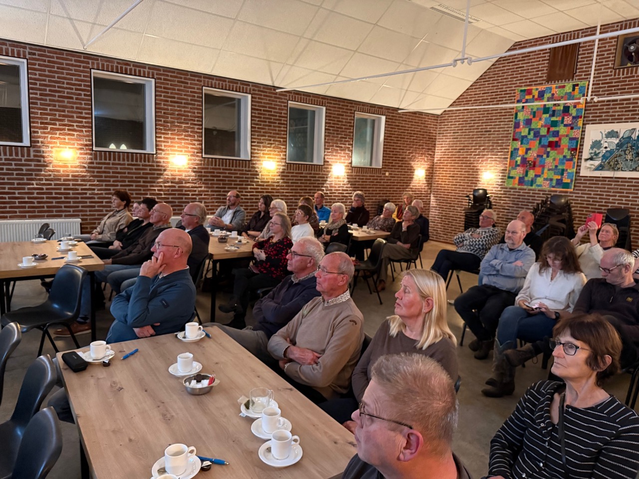 Belangstellenden bij de lezing over de watersnoodramp van 1825